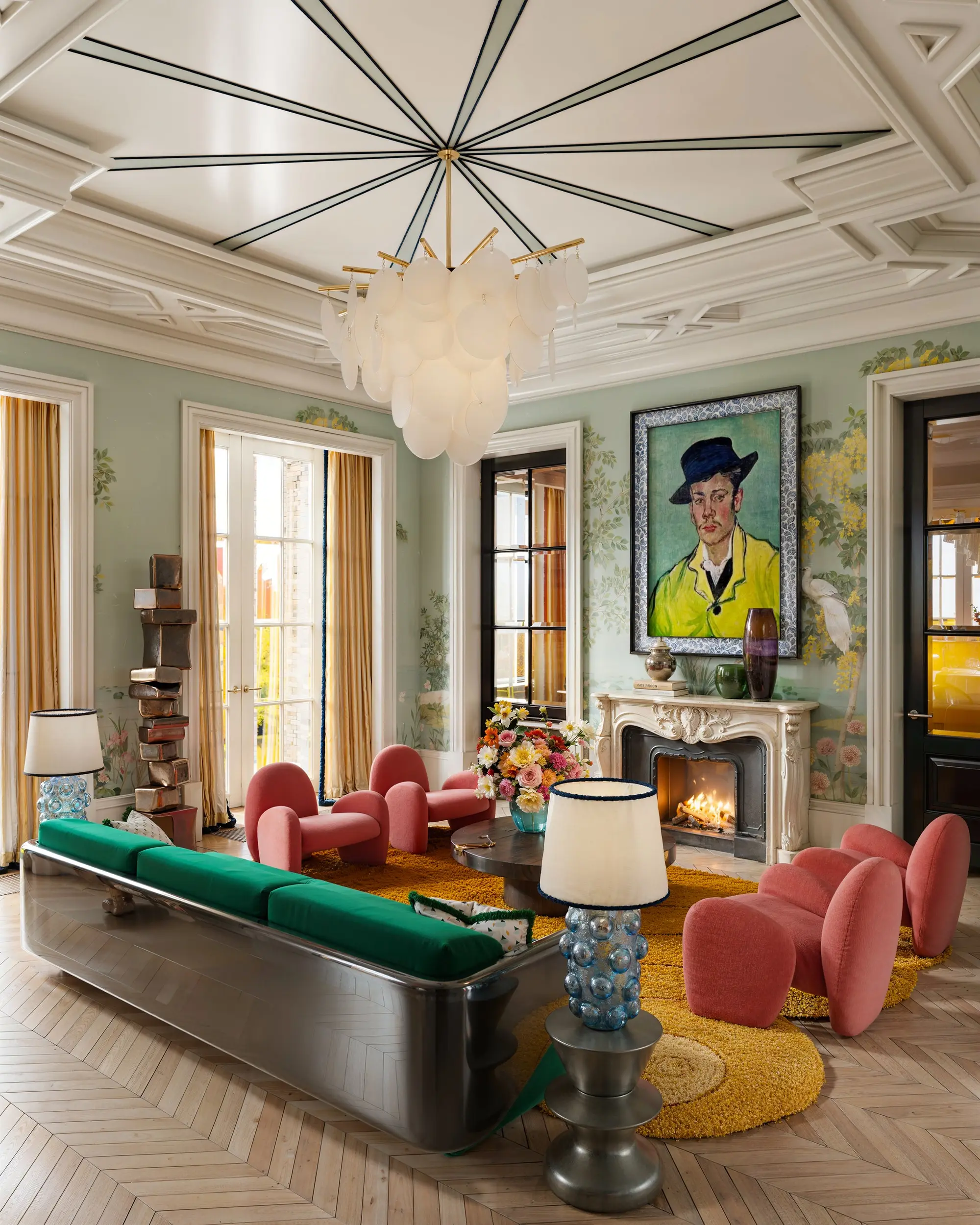 Bold living room with a coffered ceiling and steel sofa