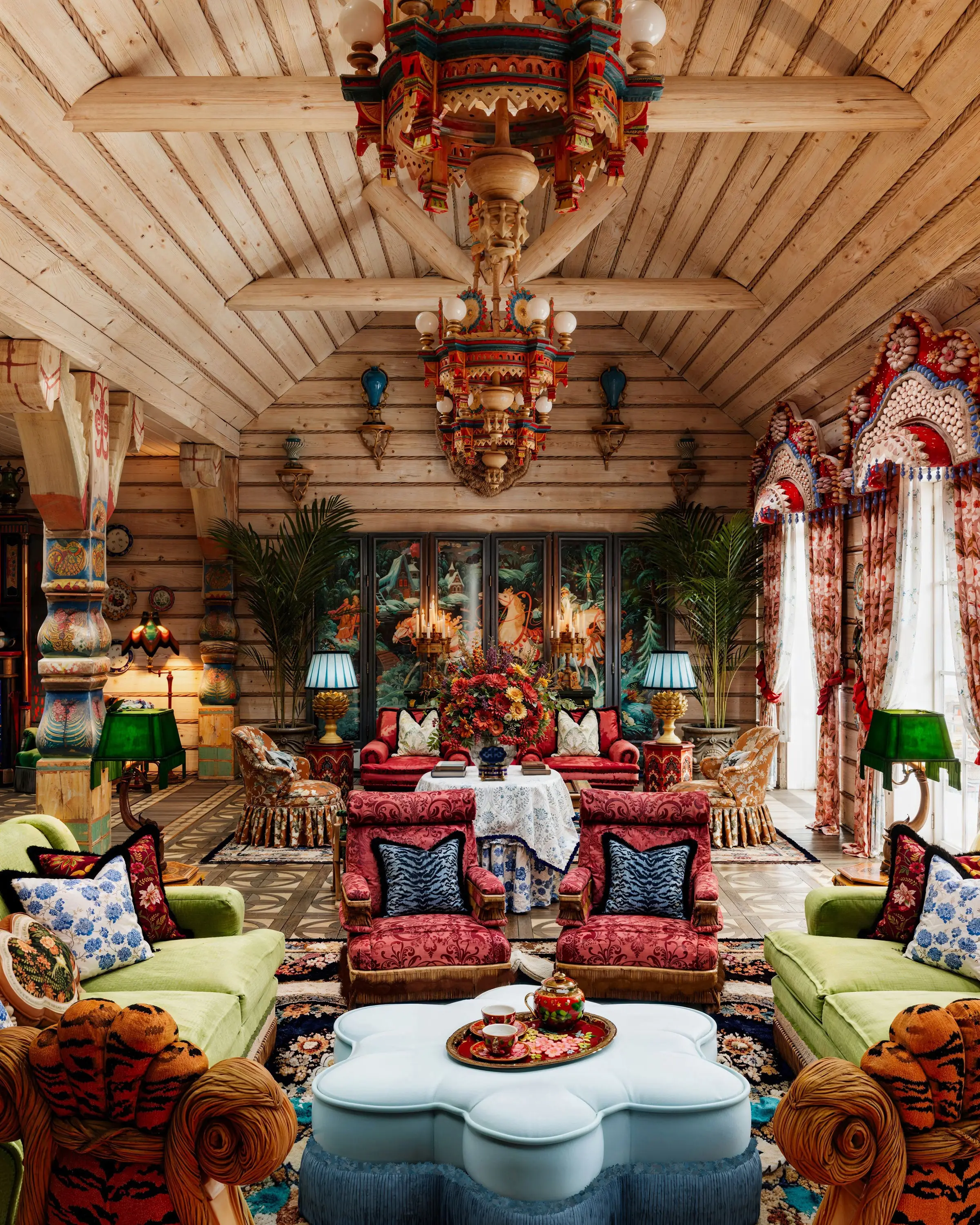 Living room in a country house with painted Russian chandeliers
