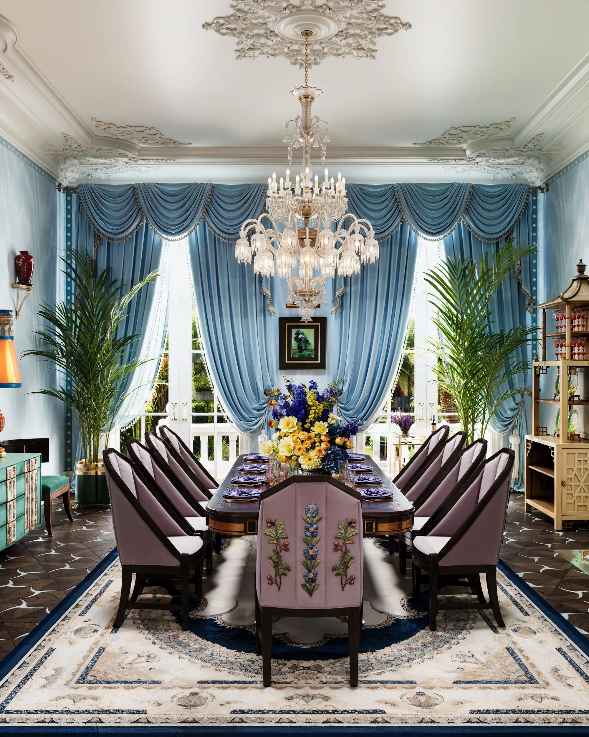 Pale blue dining room with silk swags